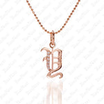 The picture shows a 14K rose gold Koa Nani Y initial pendant.