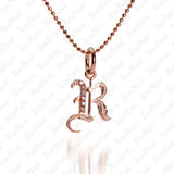 The picture shows a 14K rose gold Koa Nani R initial pendant.