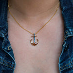 14k Gold Anchor pendant, with Koa Wood and blue  sapphire. on a golden 16" to 18" cable chain. 