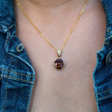 14K gold circular Koa wood and diamond pendant on a 16" - 18" gold chain.