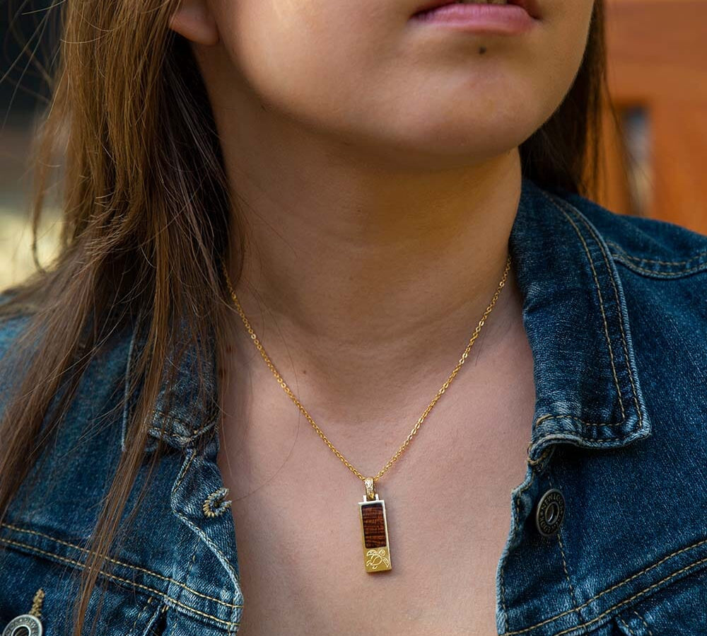 14K gold Koa wood embedded bar pendant, with a Sea Turtle design. 