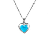 The picture shows a 925 sterling silver larimar heart pendant.