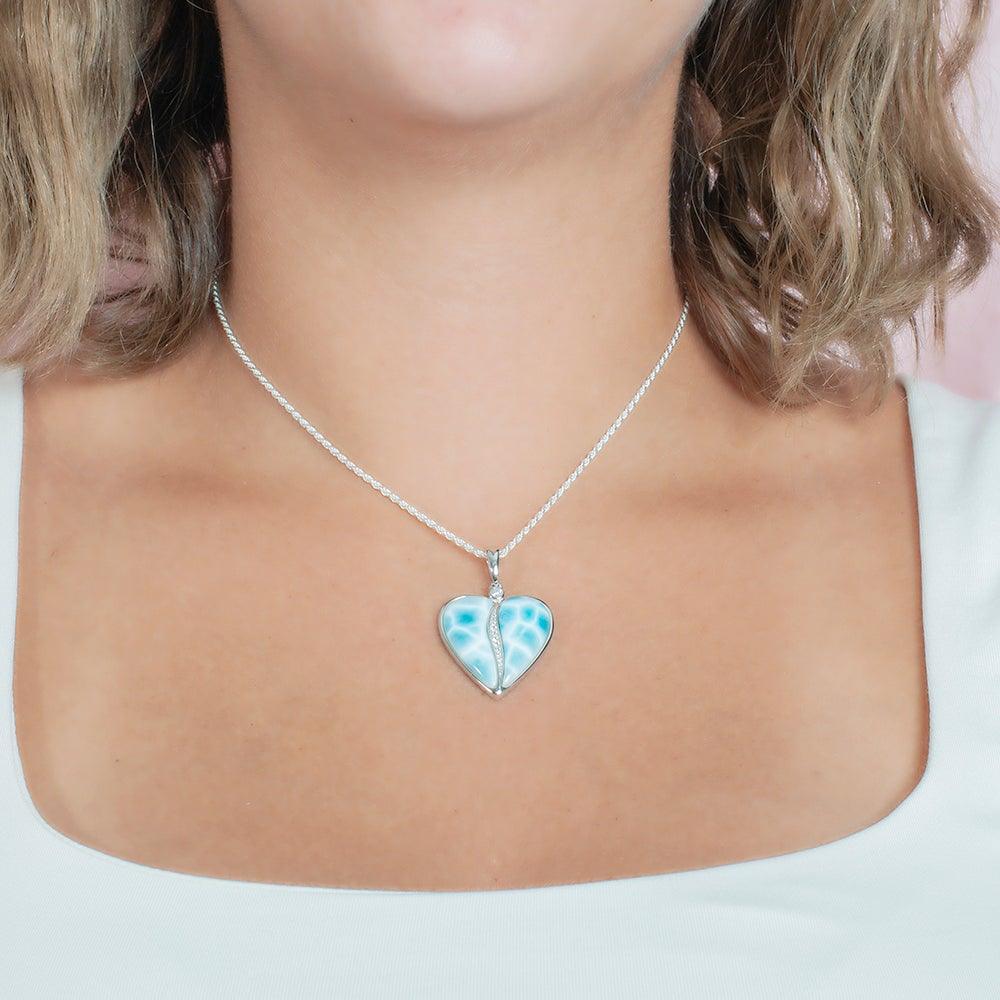 The picture shows a sterling silver larimar heart pendant.