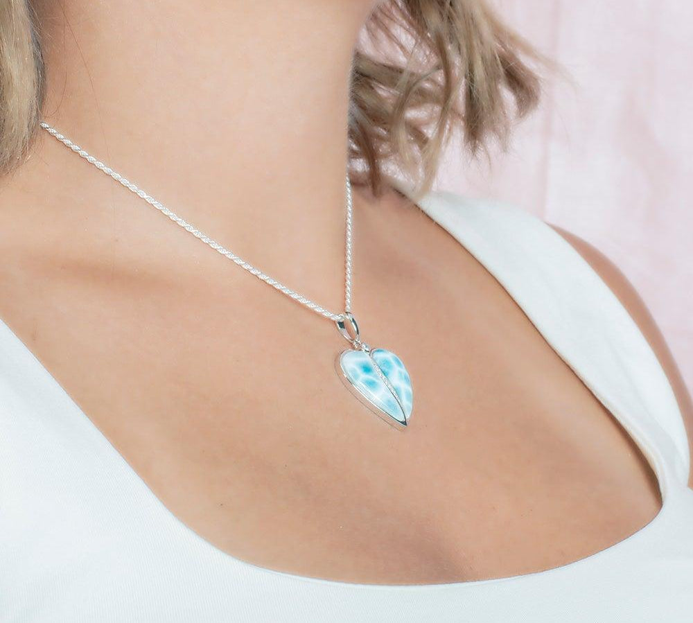 The picture shows a sterling silver larimar heart pendant.