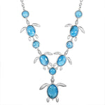 The picture shows a 925 sterling silver larimar sea turtle charm necklace.