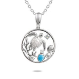 The picture shows a 925 sterling silver one stone larimar sea turtle pendant with larimar gemstones and topaz.
