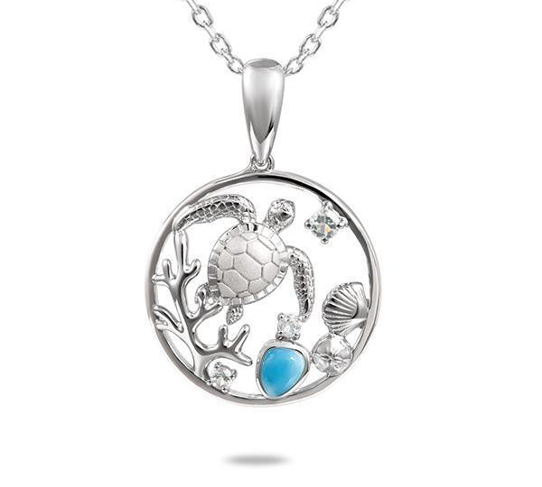 The picture shows a 925 sterling silver one stone larimar sea turtle pendant with larimar gemstones and topaz.
