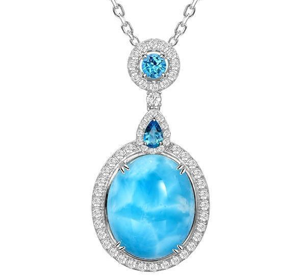 The picture shows a 925 sterling silver larimar pendant with topaz and sapphire.