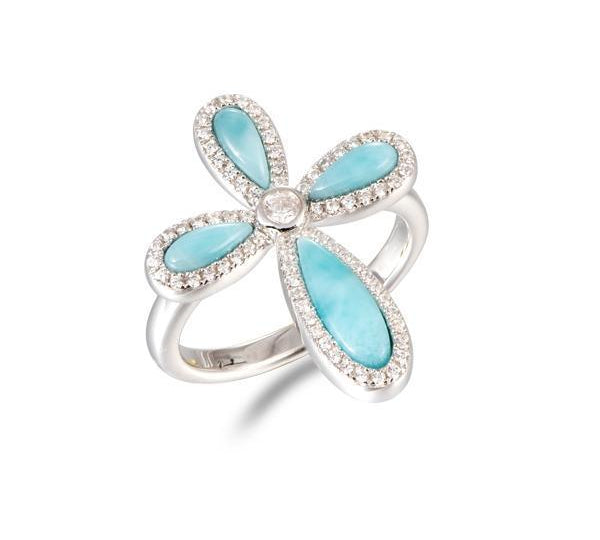 The picture shows a 925 sterling silver larimar cross ring with topaz