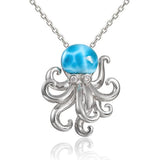 The picture shows a 925 sterling silver larimar octopus pendant with cubic zirconia eyes.