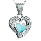 The picture shows a 925 sterling silver larimar heart pendant.