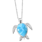 The picture shows a 925 sterling silver larimar sea turtle pendant.