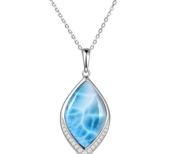 The picture shows a 925 sterling silver larimar loa mandorla pendant with topaz.