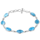 The picture shows a 925 sterling silver larimar mandorla bracelet.