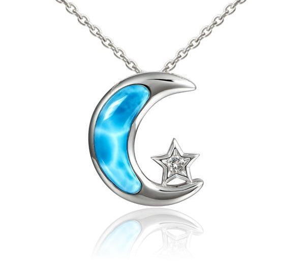 The picture shows a 925 sterling silver larimar moon and star pendant with topaz.