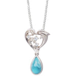 The picture shows a sterling silver larimar dolphin pendant with a heart and wave motif, aquamarines, and topaz.