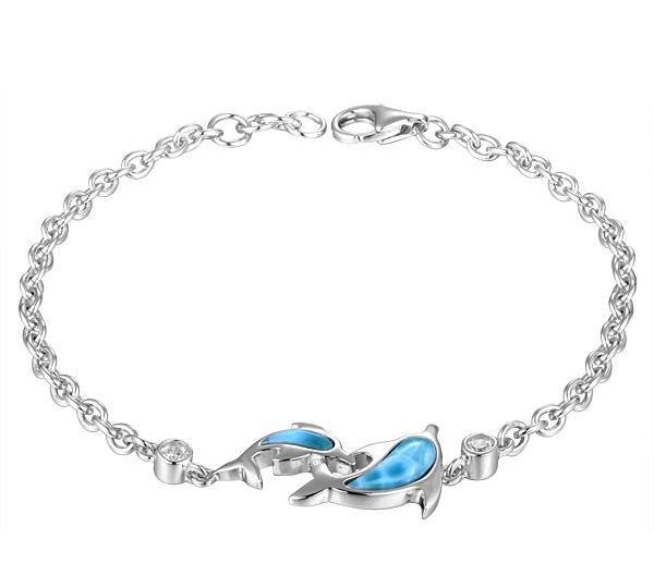 The picture shows a 925 sterling silver larimar two dolphin lovers bracelet with topaz.
