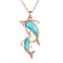 The picture shows a 14K rose gold two dolphin pendant with larimar gemstones.
