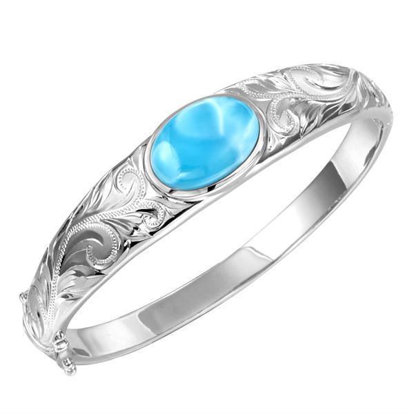 The picture shows a 925 sterling silver bangle with one oval larimar gemstone and engravings.