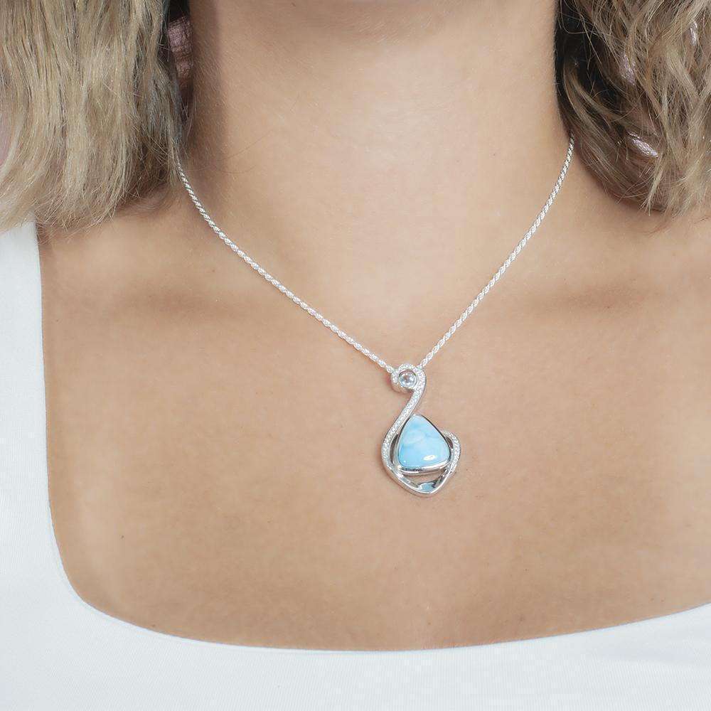 The picture shows a 925 sterling silver larimar reuleaux wave pendant.