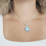 The picture shows a 925 sterling silver larimar reuleaux wave pendant.
