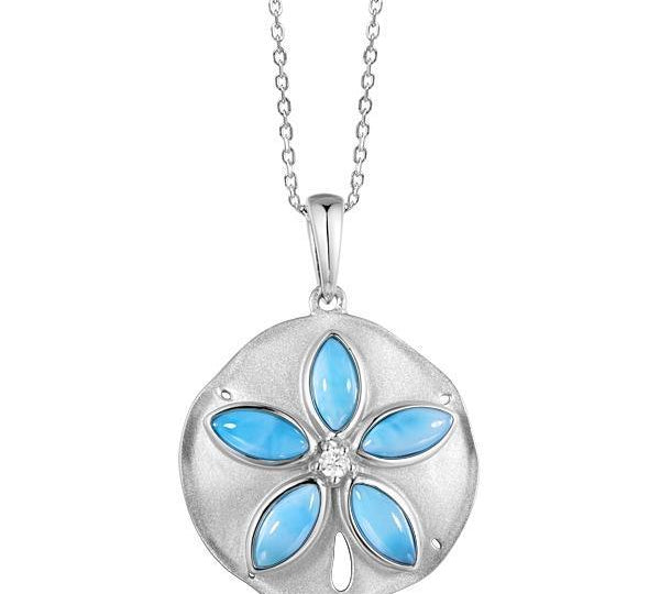 The picture shows a 925 sterling silver larimar sand dollar pendant with topaz.