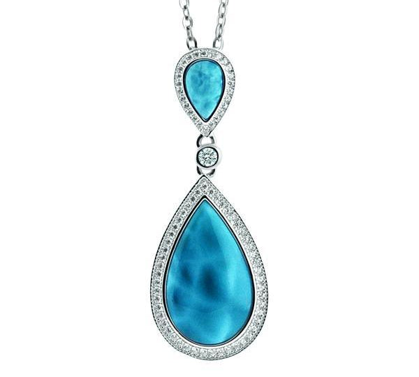 The picture shows a 925 sterling silver larimar two teardrop pendant with cubic zirconia.