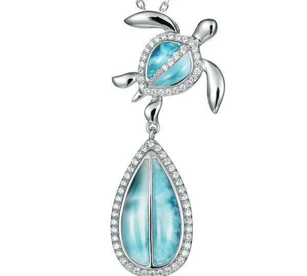 The picture shows a 925 sterling silver larimar sea turtle pendant.