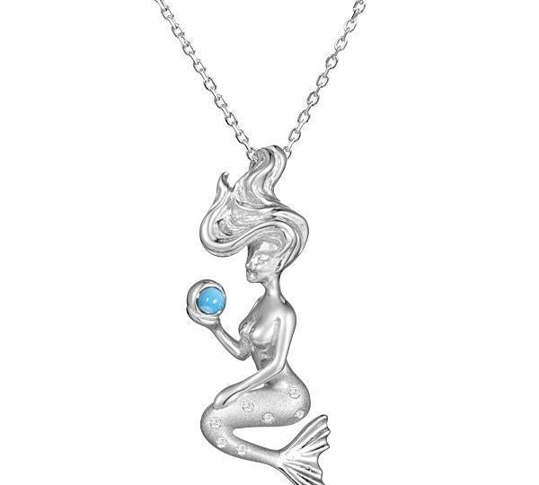 The picture shows a small 925 sterling silver larimar wishing mermaid pendant.