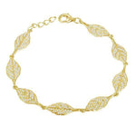 In this photo there is a yellow gold plated maile leaf bracelet with cubic zirconia.