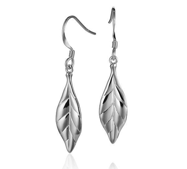 The picture shows a pair of 14K white gold maile leaf hook earrings.