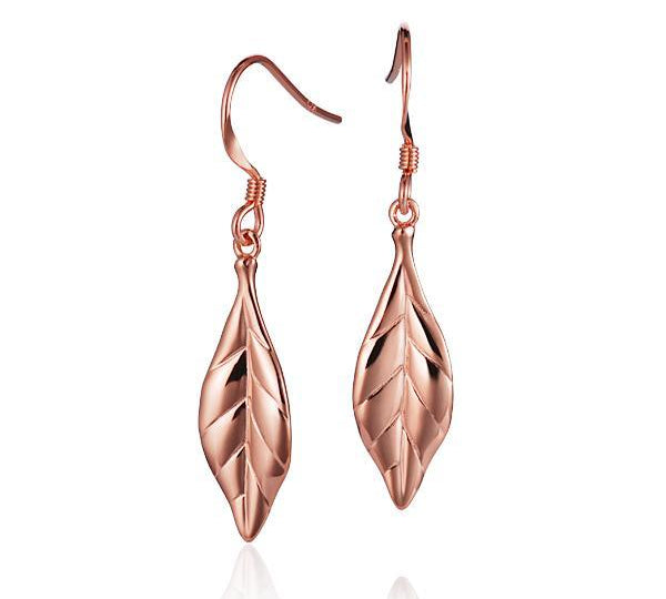 The picture shows a pair of 14K rose gold maile leaf hook earrings.