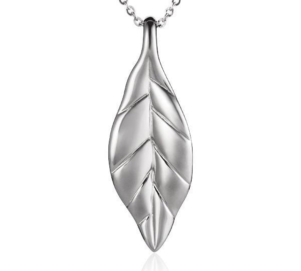 In this photo there is a large sterling silver maile leaf pendant.