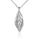 In this photo there is a medium sized sterling silver maile leaf pendant.