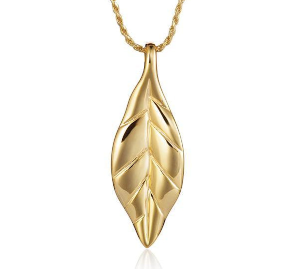 In this photo there is a yellow gold maile leaf pendant.
