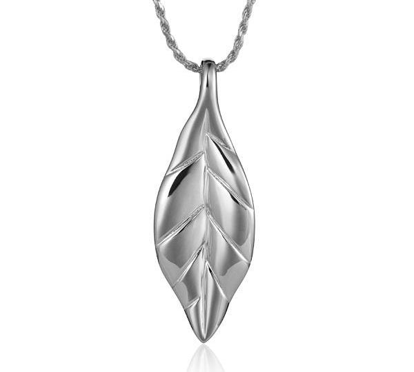 In this photo there is a white gold maile leaf pendant.