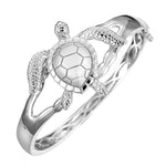 The picture shows a 925 sterling silver sea turtle bangle.