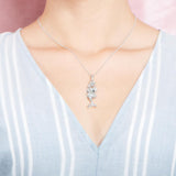 The picture shows a model wearing a 925 sterling silver mermaid pendant.