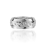 The picture shows a 925 sterling silver 8 mm ring with hand engravings of scrolls.