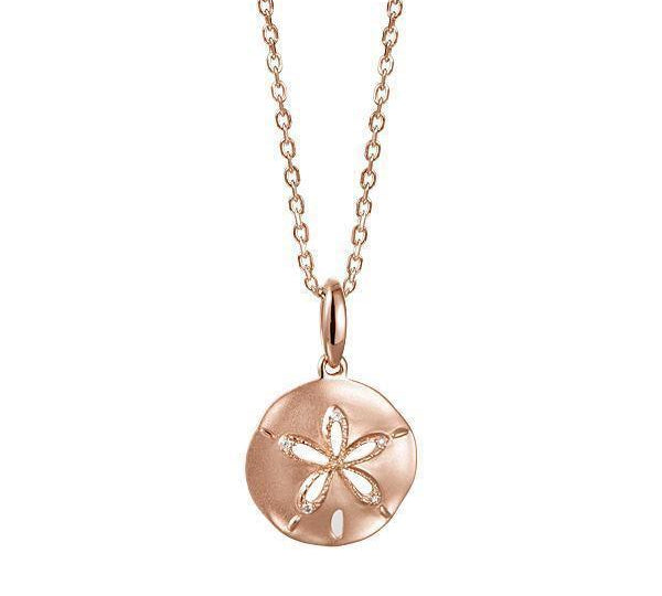 The picture shows a small 14K rose gold sand dollar cut out pendant with diamonds.