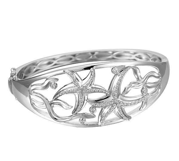 The picture shows a 925 sterling silver two starfish bangle with seaweed and topaz.