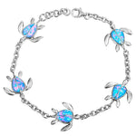 The picture shows a 925 sterling silver opalite sea turtle charm bracelet.