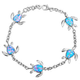 The picture shows a 925 sterling silver opalite sea turtle charm bracelet.