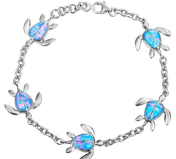 The picture shows a 925 sterling silver opalite sea turtle charm bracelet.