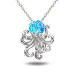 The picture shows a 925 sterling silver opalite octopus pendant with topaz.