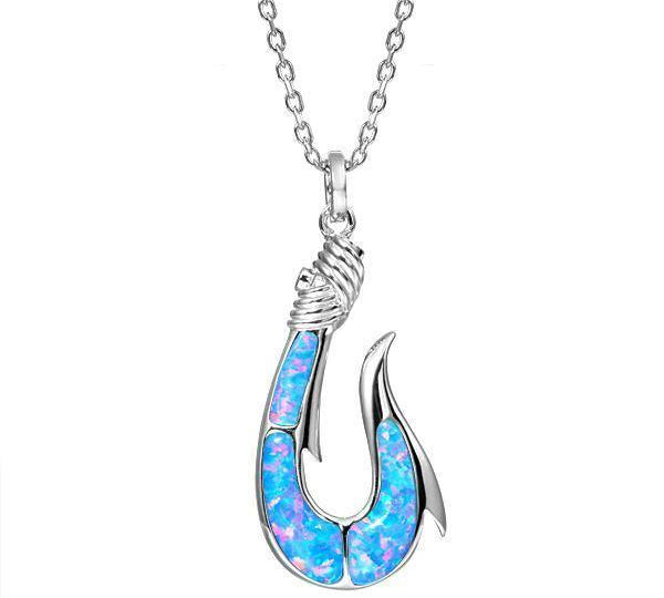 In this photo there is a sterling silver fish hook pendant with blue opalite gemstones.