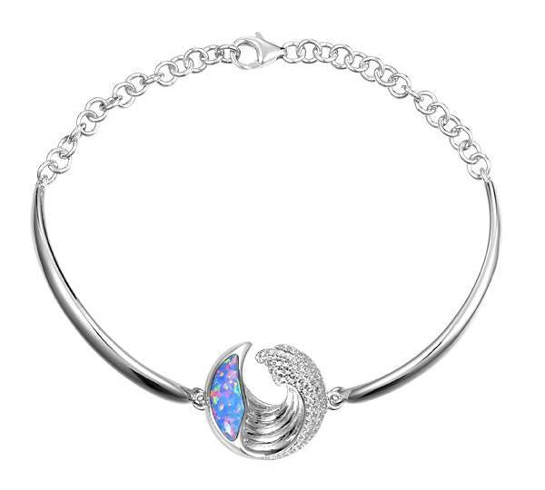 The picture shows a 925 sterling silver opalite ocean wave bracelet with cubic zirconia.
