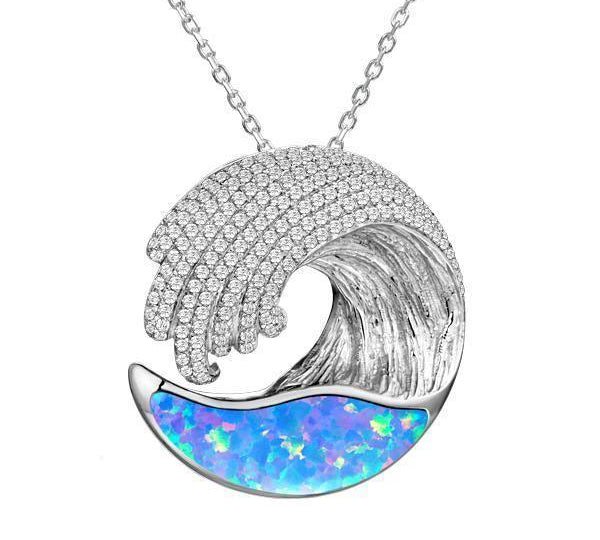 The picture shows a 925 sterling silver opalite ocean wave pendant with cubic zirconia.