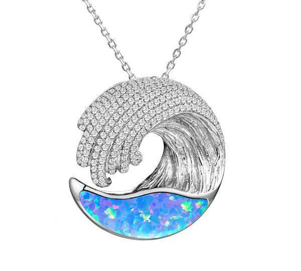 The picture shows a 925 sterling silver opalite ocean wave pendant with cubic zirconia.