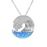 The picture shows a 925 sterling silver opalite ocean wave pendant with cubic zirconia.